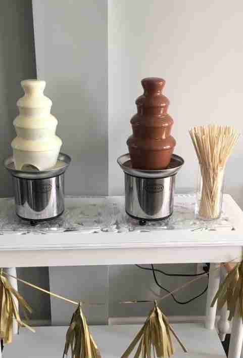 multiple chocolate fountain machine on table