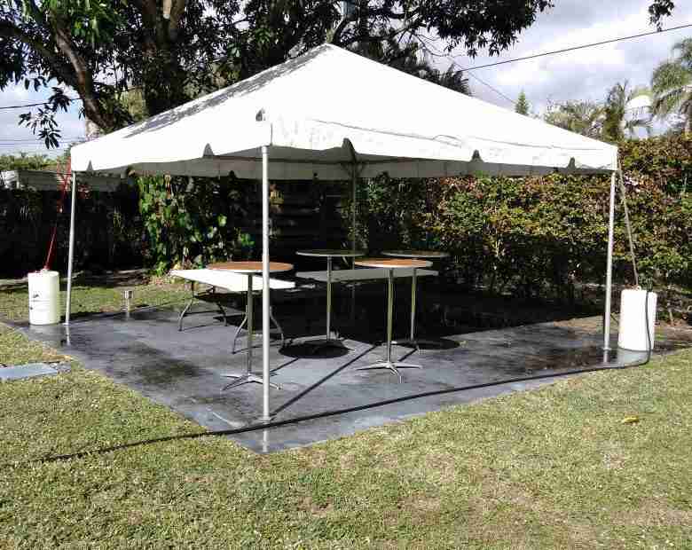 party tent installation on grass